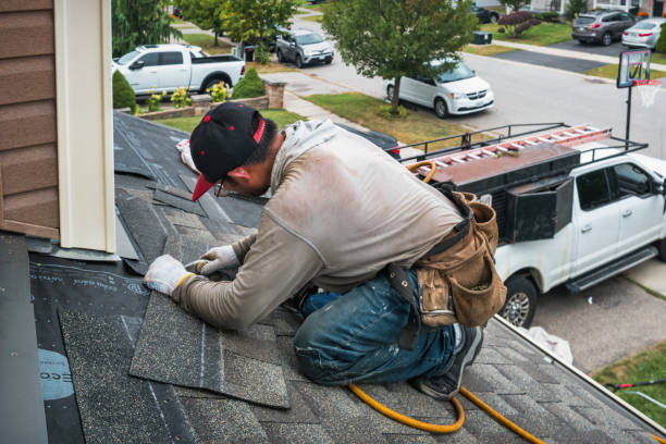 Professional Gutter Installation technician working in Fairview, GA